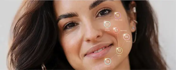 Woman's face showing results of the Intelli-SKIN facial scan.